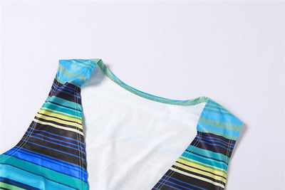 Women's green, blue, and yellow striped two-piece set with a V-neck crop top and an asymmetrical mini skirt. - Image 15