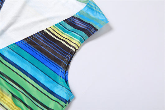 Women's green, blue, and yellow striped two-piece set with a V-neck crop top and an asymmetrical mini skirt. - Image 16
