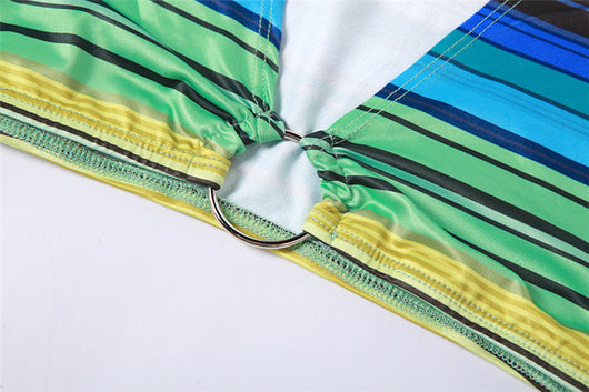 Women's green, blue, and yellow striped two-piece set with a V-neck crop top and an asymmetrical mini skirt. - Image 17