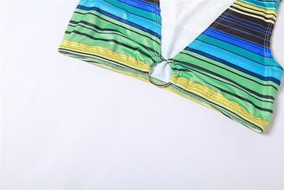 Women's green, blue, and yellow striped two-piece set with a V-neck crop top and an asymmetrical mini skirt. - Image 18