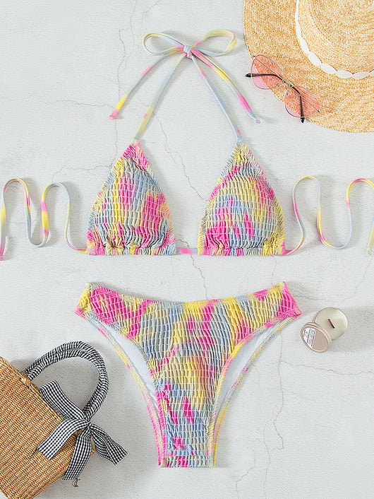 Multicolor tie-dye ruched two-piece swimsuit with a triangle bikini top and matching high-cut bottom. - Image 11