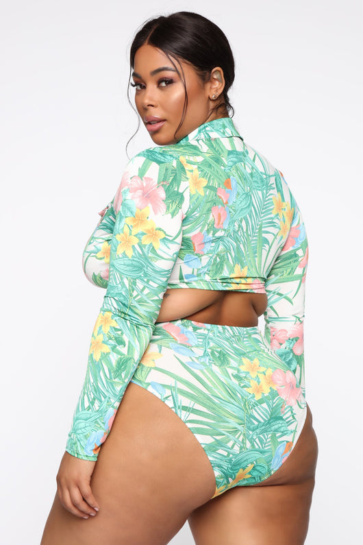 Long sleeve high waist bikini with tropical floral and leaf print, featuring a tie-front top. - Image 13
