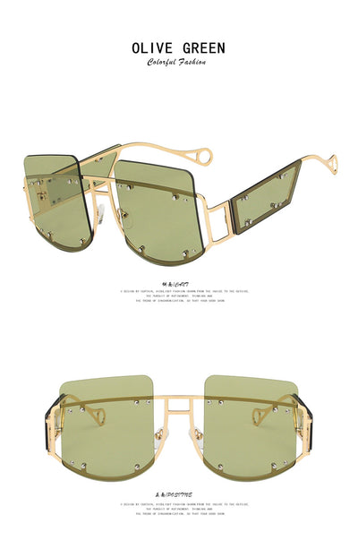 Red oversized rimless sunglasses with a unique geometric design and gold-tone metal temples. - Image 15