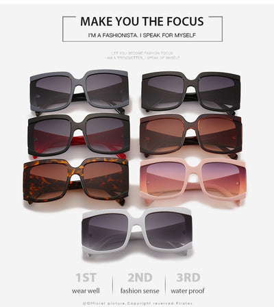 Oversized square-frame sunglasses with a light pink frame and gradient lenses transitioning from purple to orange to yellow. - Image 13