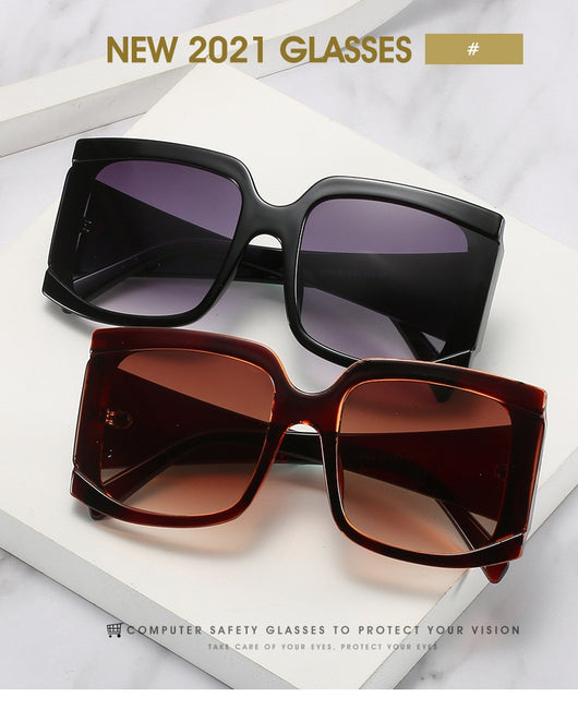 Oversized square-frame sunglasses with a light pink frame and gradient lenses transitioning from purple to orange to yellow. - Image 14