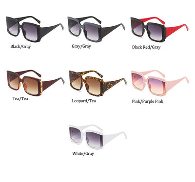 Oversized square-frame sunglasses with a light pink frame and gradient lenses transitioning from purple to orange to yellow. - Image 17