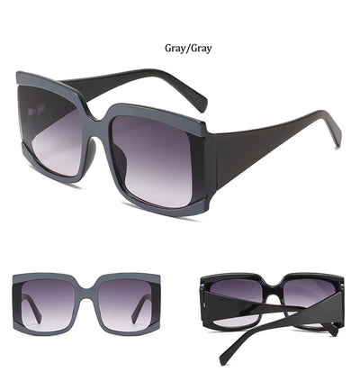 Oversized square-frame sunglasses with a light pink frame and gradient lenses transitioning from purple to orange to yellow. - Image 19