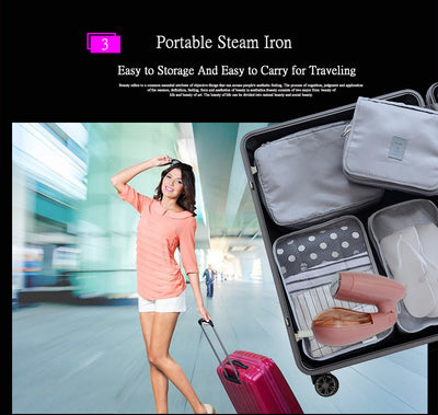 Pink handheld garment steamer with a clear water tank, silver soleplate, and a detachable brush attachment. - Image 14