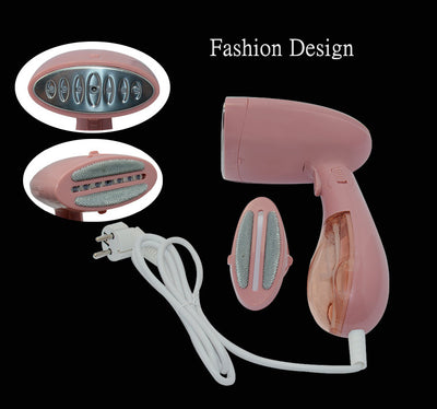 Pink handheld garment steamer with a clear water tank, silver soleplate, and a detachable brush attachment. - Image 16
