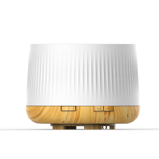 White essential oil aromatherapy machine and ultrasonic humidifier with a ribbed texture and control buttons. - Image 7