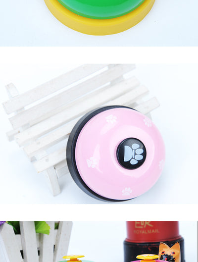 Blue and yellow pet training bell with white paw print designs and a large yellow button on top. - Image 20