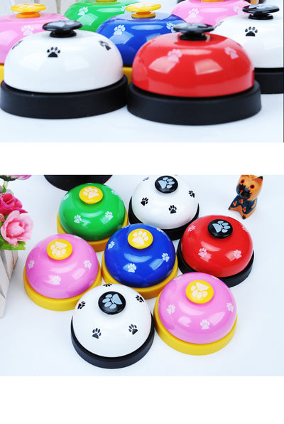 Blue and yellow pet training bell with white paw print designs and a large yellow button on top. - Image 21