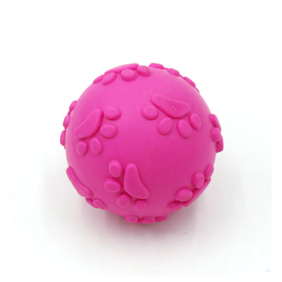 Bright pink TPR dog toy ball with raised paw print and oval patterns, designed for chewing and play. - Image 5