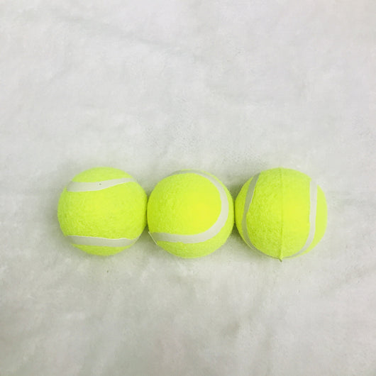 Three bright yellow dog tennis balls with white seams, made of rubber and felt, stacked on a soft background. - Image 11