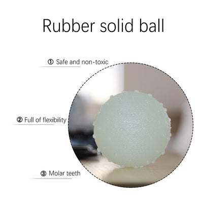 Interactive pet glow ball, off-white in daylight and glowing green in the evening, with a textured surface. - Image 11
