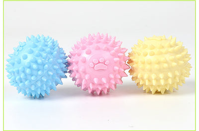 Yellow spiky pet toy ball with a paw print design, made from TPR for interactive play and molars. - Image 9