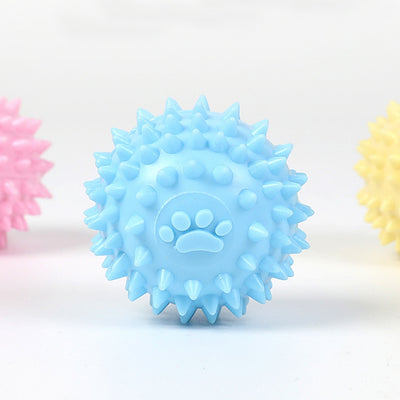 Yellow spiky pet toy ball with a paw print design, made from TPR for interactive play and molars. - Image 18