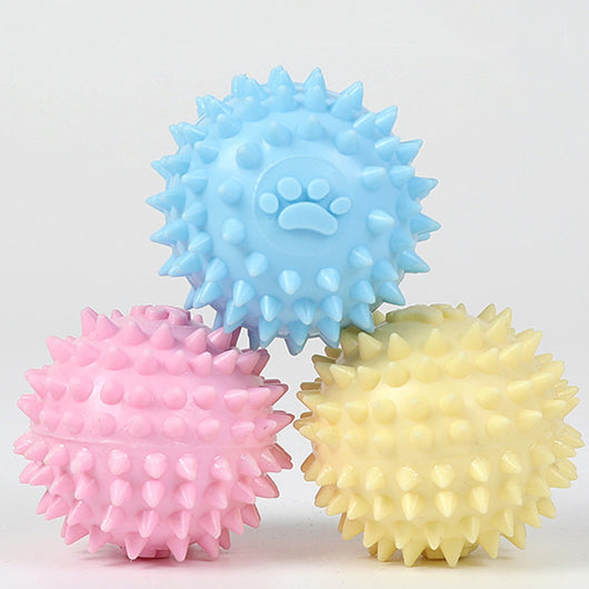 Yellow spiky pet toy ball with a paw print design, made from TPR for interactive play and molars. - Image 21