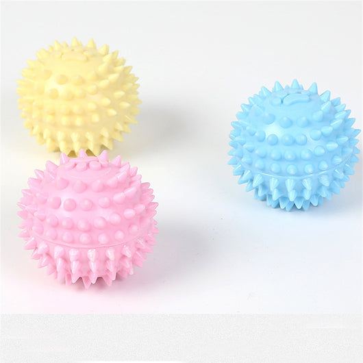 Yellow spiky pet toy ball with a paw print design, made from TPR for interactive play and molars. - Image 23