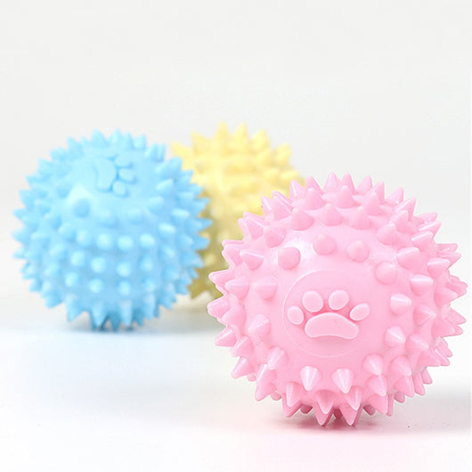 Yellow spiky pet toy ball with a paw print design, made from TPR for interactive play and molars. - Image 24
