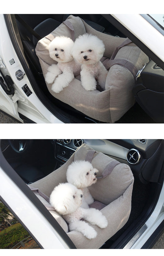 Beige pet car carrier seat with tan straps and a separate red pet seatbelt leash for safe car travel. - Image 19