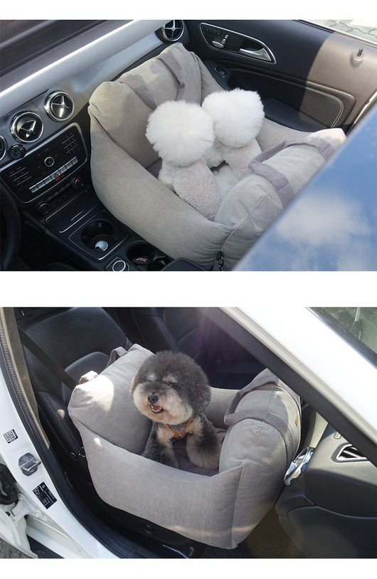 Beige pet car carrier seat with tan straps and a separate red pet seatbelt leash for safe car travel. - Image 20
