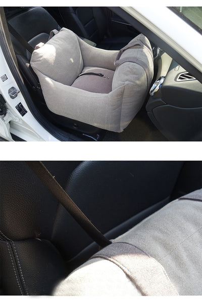 Beige pet car carrier seat with tan straps and a separate red pet seatbelt leash for safe car travel. - Image 25