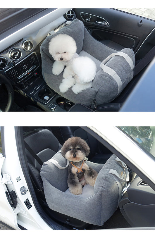 Beige pet car carrier seat with tan straps and a separate red pet seatbelt leash for safe car travel. - Image 33