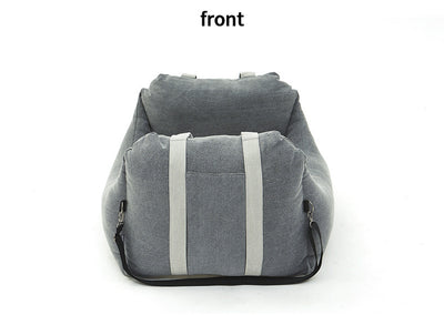 Beige pet car carrier seat with tan straps and a separate red pet seatbelt leash for safe car travel. - Image 35