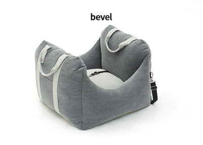 Beige pet car carrier seat with tan straps and a separate red pet seatbelt leash for safe car travel. - Image 37