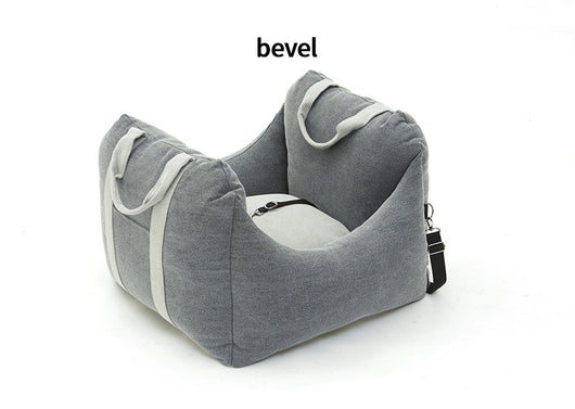 Beige pet car carrier seat with tan straps and a separate red pet seatbelt leash for safe car travel. - Image 37