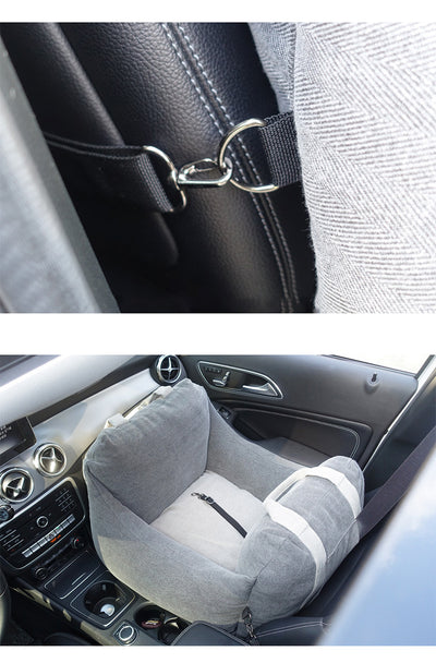 Beige pet car carrier seat with tan straps and a separate red pet seatbelt leash for safe car travel. - Image 39