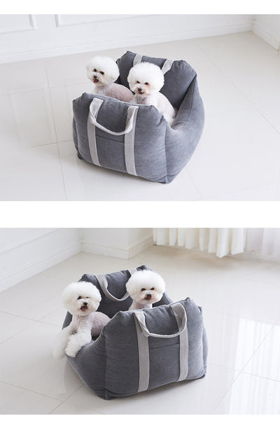 Beige pet car carrier seat with tan straps and a separate red pet seatbelt leash for safe car travel. - Image 41