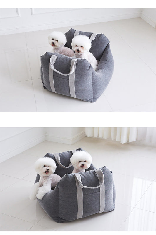 Beige pet car carrier seat with tan straps and a separate red pet seatbelt leash for safe car travel. - Image 41