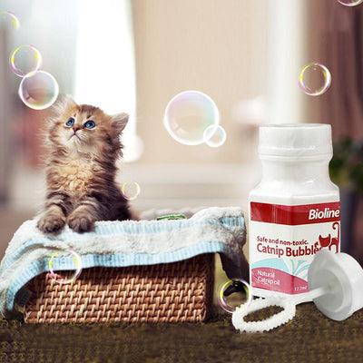 Bioline Catnip Bubbles bottle with a red label, featuring a cat silhouette and text "Safe and non-toxic. Natural Catnip oil 17.7ml". A white bubble wand is next - Image 8