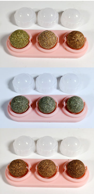 Two self-adhesive rotated catnip lick balls, each in a light blue holder, for cat entertainment. - Image 17