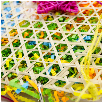 Colorful bird toy made from woven straw, filled with shredded paper, with a red star and hanging hook. - Image 14