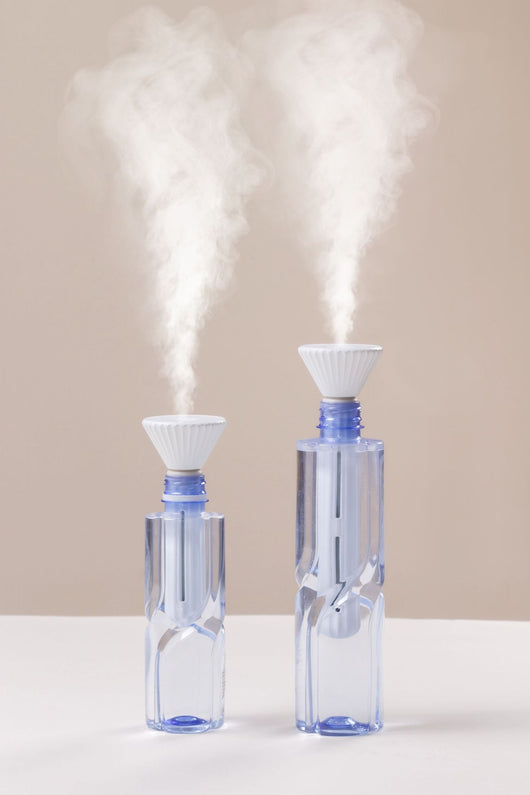 Beige and white USB ultrasonic humidifier with a fluted conical top and a cylindrical body with a water level window. - Image 18
