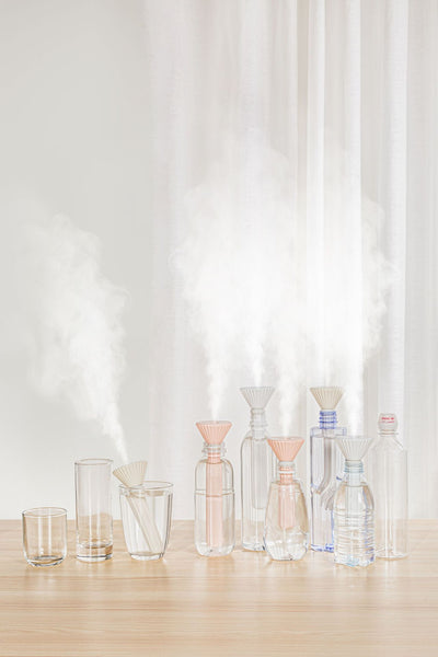 Beige and white USB ultrasonic humidifier with a fluted conical top and a cylindrical body with a water level window. - Image 24