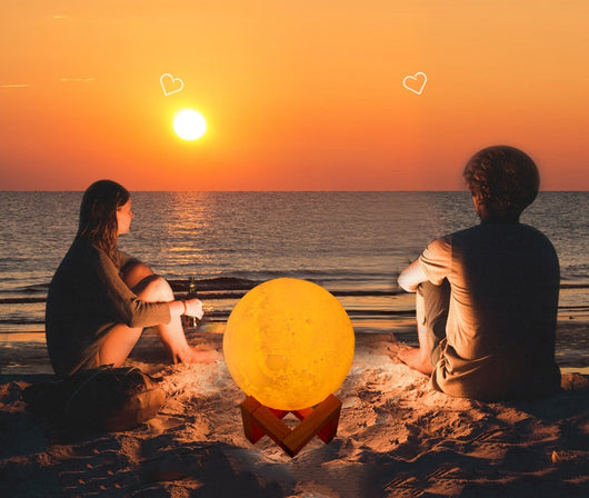 Moon-shaped night light and air humidifier on a wooden stand, emitting mist and a warm glow, with books and flowers. - Image 28