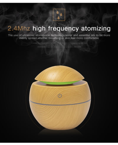 Black spherical ultrasonic atomizer with a power button icon, designed for aromatherapy and humidification. - Image 15