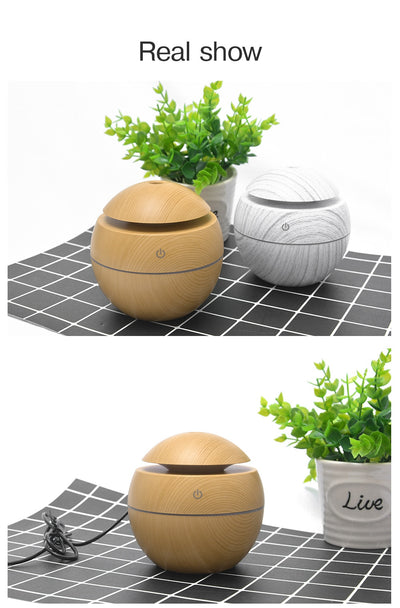 Black spherical ultrasonic atomizer with a power button icon, designed for aromatherapy and humidification. - Image 24