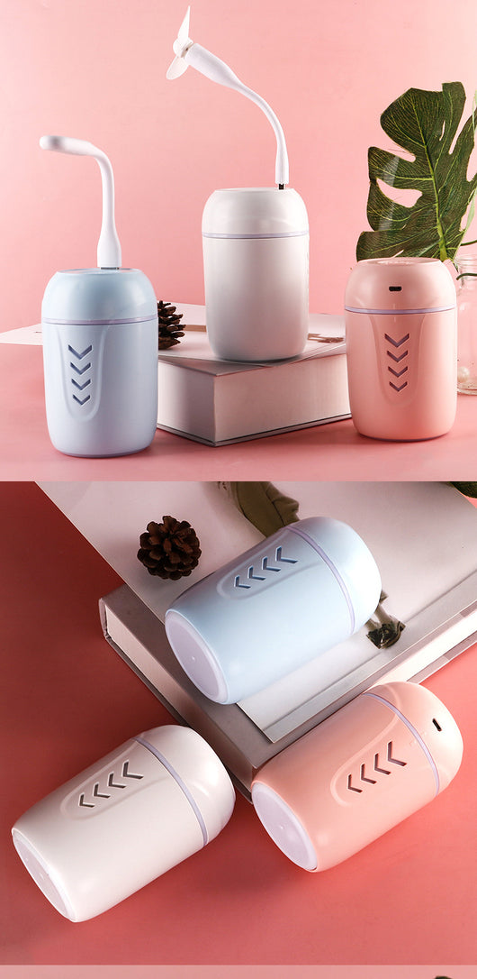 Light blue portable car humidifier with chevron pattern, white USB LED light, and white USB mini fan. - Image 11