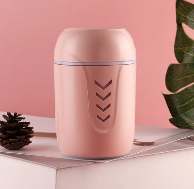 Light blue portable car humidifier with chevron pattern, white USB LED light, and white USB mini fan. - Image 12