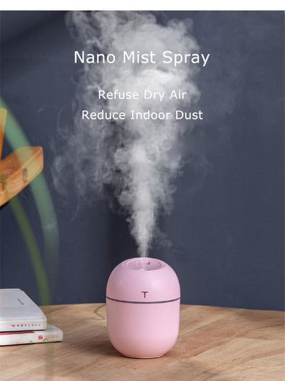 White egg-shaped mini USB humidifier with a 220ml capacity, featuring a subtle 'T' logo and grey accent line. - Image 15