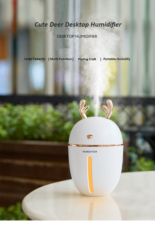 Pink deer-shaped ultrasonic humidifier with gold antlers, a white USB fan, and a white USB light. - Image 12