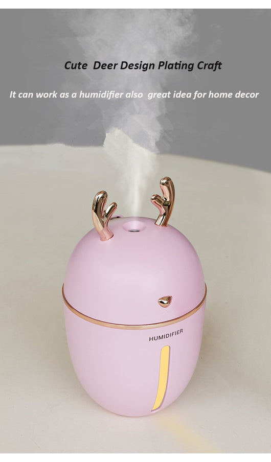 Pink deer-shaped ultrasonic humidifier with gold antlers, a white USB fan, and a white USB light. - Image 14