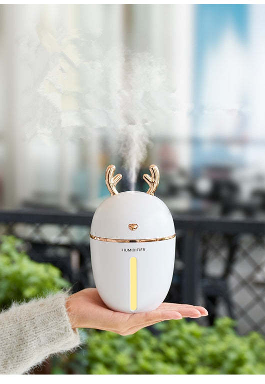 Pink deer-shaped ultrasonic humidifier with gold antlers, a white USB fan, and a white USB light. - Image 23