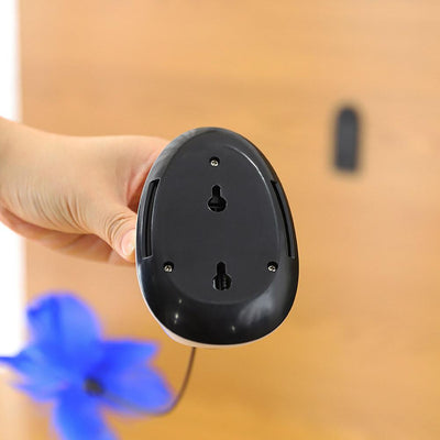 Electric cat toy with a white dome base, a flexible black rod, and a vibrant blue feather attachment. - Image 13