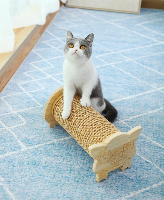 Cat scratcher with a corrugated cardboard cylinder and light wood ends, one shaped like a cat's head. - Image 6